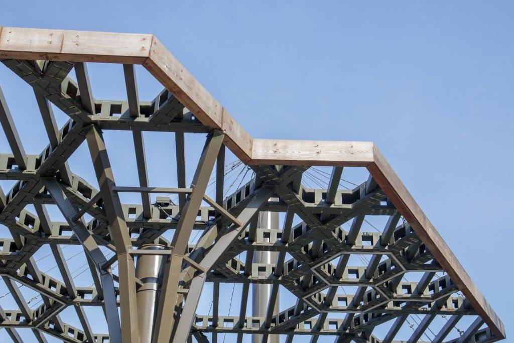 Pergola canopy, structural elements. An architectural structure of repeating arches to protect visitors from the sun. Renewed entrance lobby in Kiev on Trukhanov Island after reconstruction